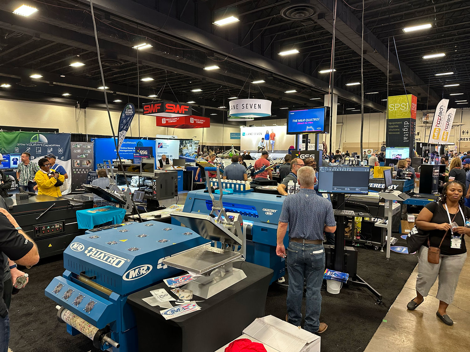 The M&R Quatro Direct-to-Film Transfer Printing System made its tradeshow debut at the GSG booth. The industrial inkjet printer is designed for direct-to-film printing and is the first of its kind from M&R. Learn more about the machine here.