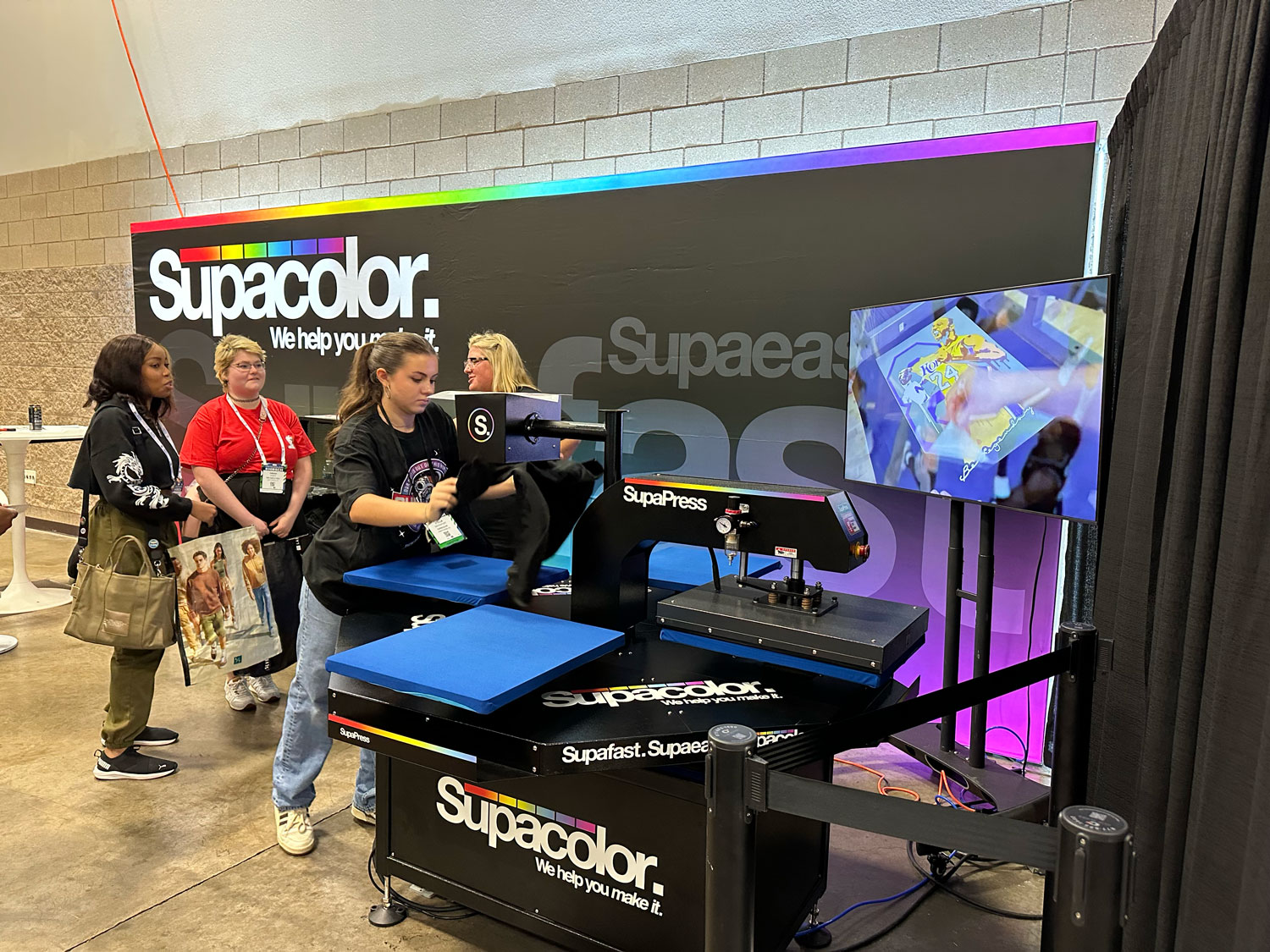 Supacolor, a company that sells screen printed DTF transfers, highlighted the benefits of transfer printing throughout the tradeshow with free Texas-based T-shirts for attendees.