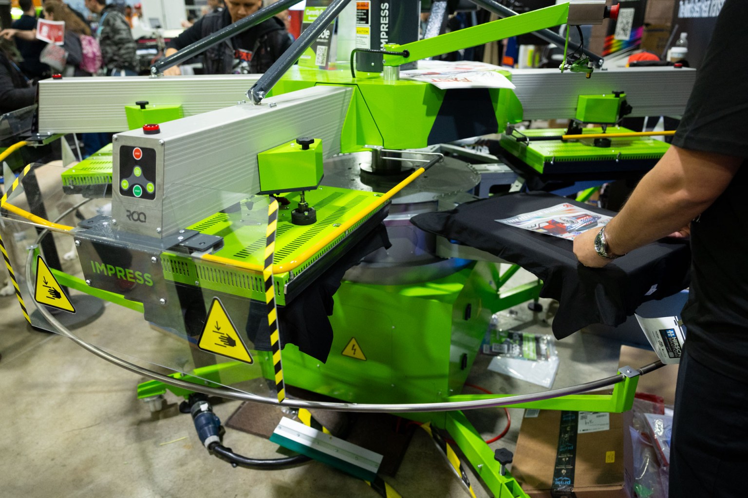 ROQ partnered with Lane Seven Apparel and Supacolor to showcase the benefits of automated heat pressing.