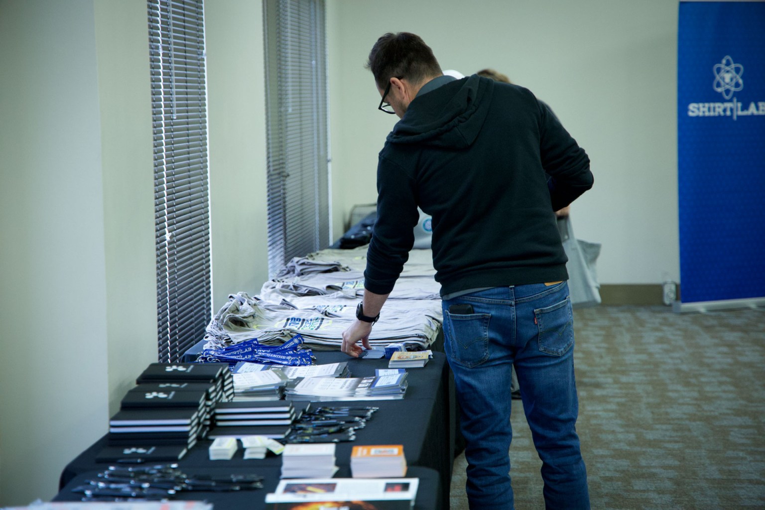Attendees received swag bags with branded event T-shirts, a utility case, a personalized notepad, and more. DTF Printing is a media sponsor of Shirt Lab.