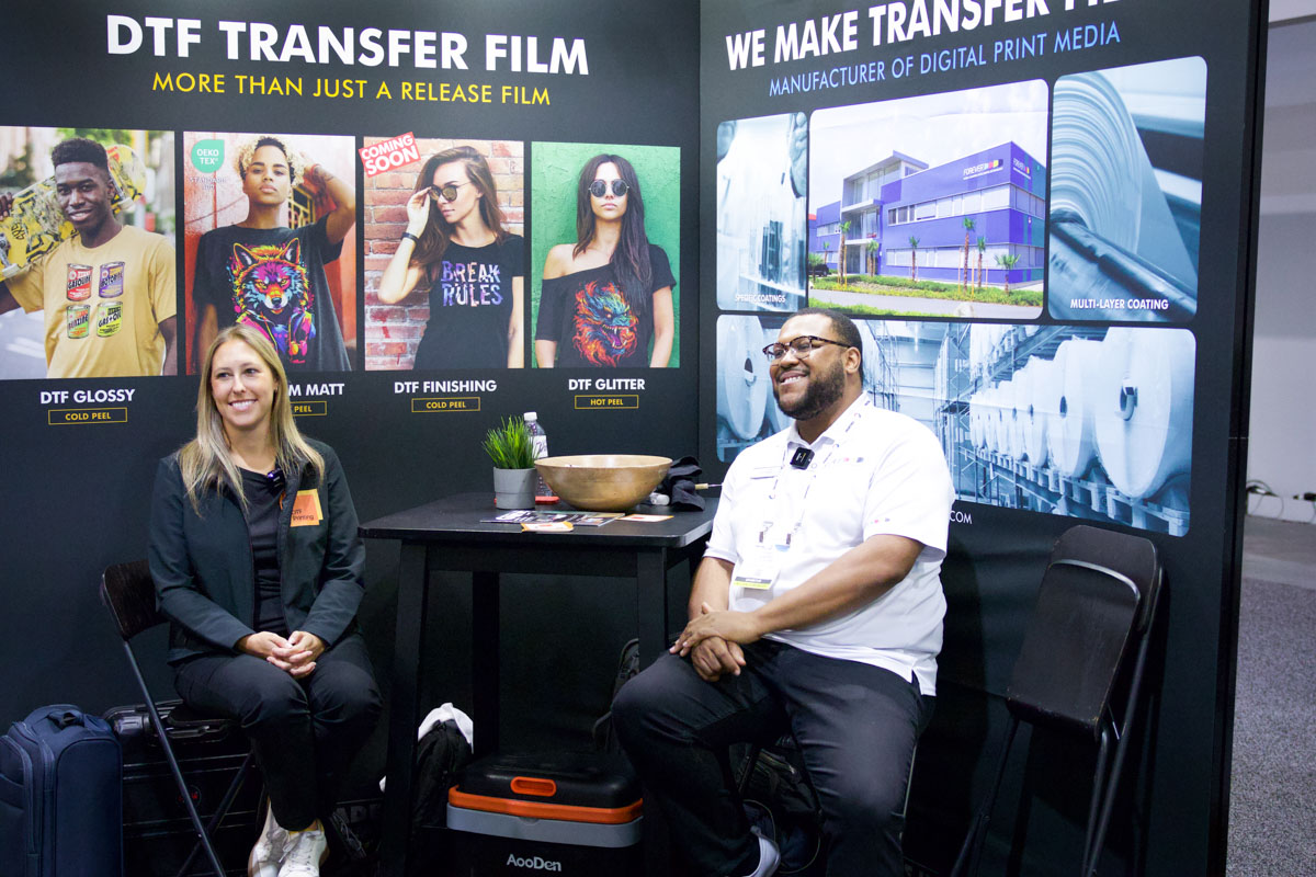 Christopher Godfrey of Forever GMBH brought the fun to the tradeshow floor with a lively podcast episode at the company’s booth. He and Adrienne Palmer talked about DTF printing, what was new on the tradeshow floor, and what to expect at DTF Expo 2025.