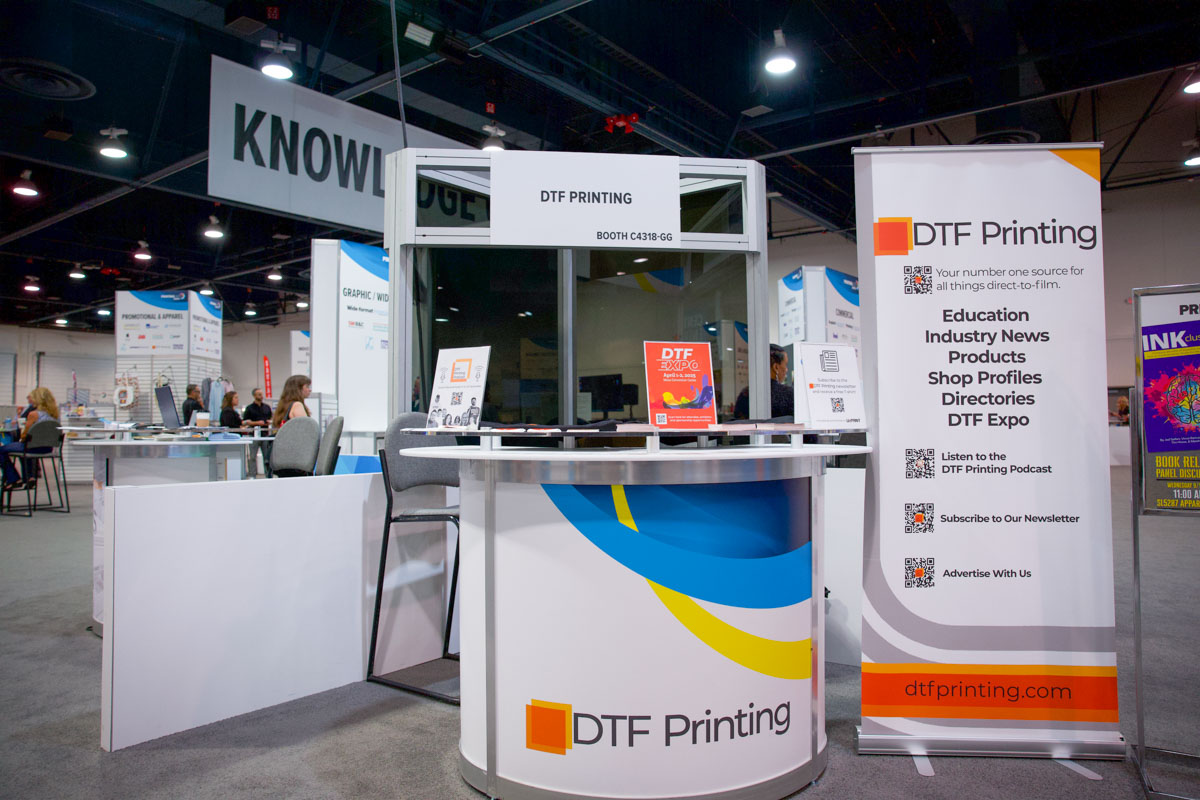 DTF Printing’s booth was a hub for learning more about provided resources and education. Attendees who subscribed to the podcast received a DTF Printing or DTF Printing Podcast branded UxPrint T-shirt.