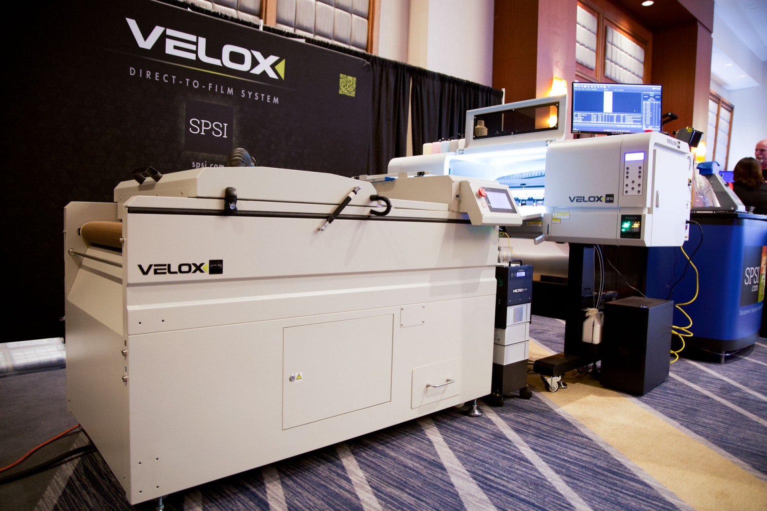 SPSI brought its Velox direct-to-film system, part of its high-production line of machines.