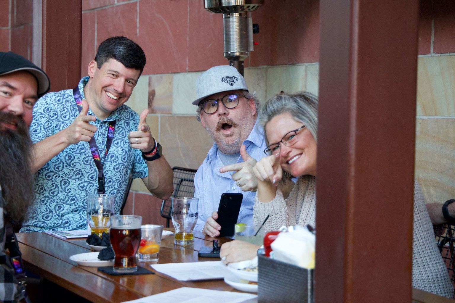 Tom Rauen, Jay Busselle, and Kim Johnson enjoyed free drinks and food at the DTF Expo Happy Hour at Huss Brewery.