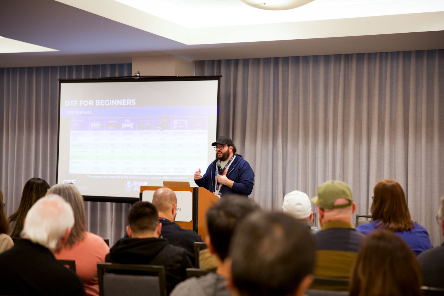 Joss Grullón, CEO of Kingdom DTF, gave a beginner's lesson to those just starting out in the DTF space. His session covered tools needed to DTF print, the pros and cons of DTF machines, and a detailed breakdown of DTF equipment and products.