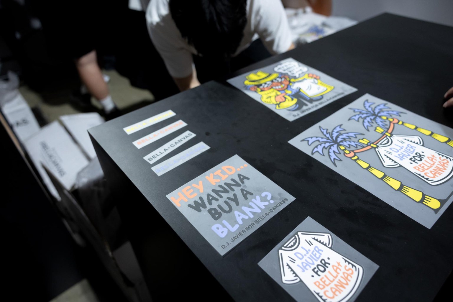Bella + Canvas broke its typical mold of live screen printing at its booth and instead heat pressed T-shirts for attendees. Graphics were provided by Santa Barbara Artist DJ Javier.