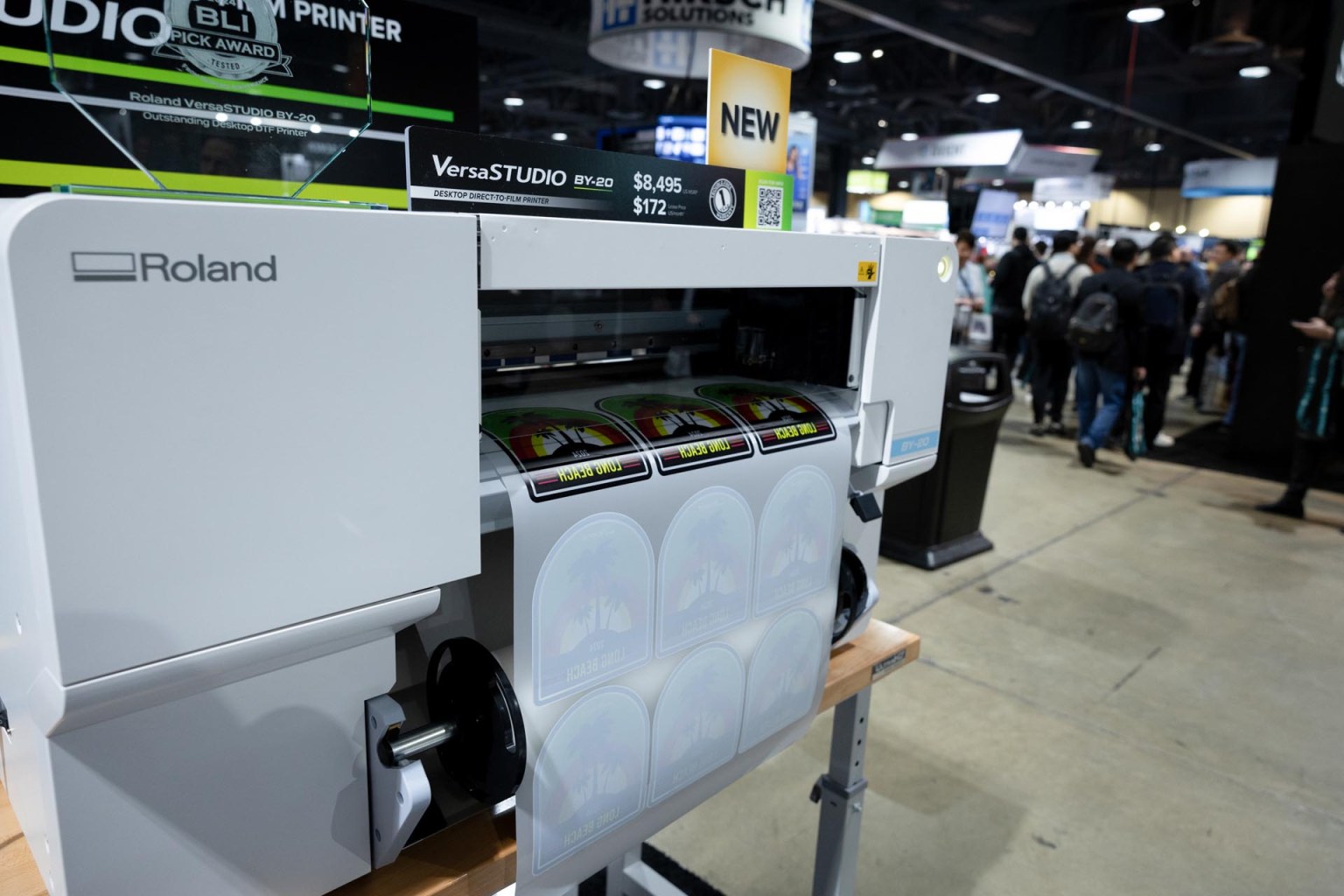 Roland DGA premiered its BY-20 desktop direct-to-film water-based printer at Impressions Expo Long Beach. Roland DGA offers a complete DTF solution, including inks, transfer film, and powder (each sold separately).