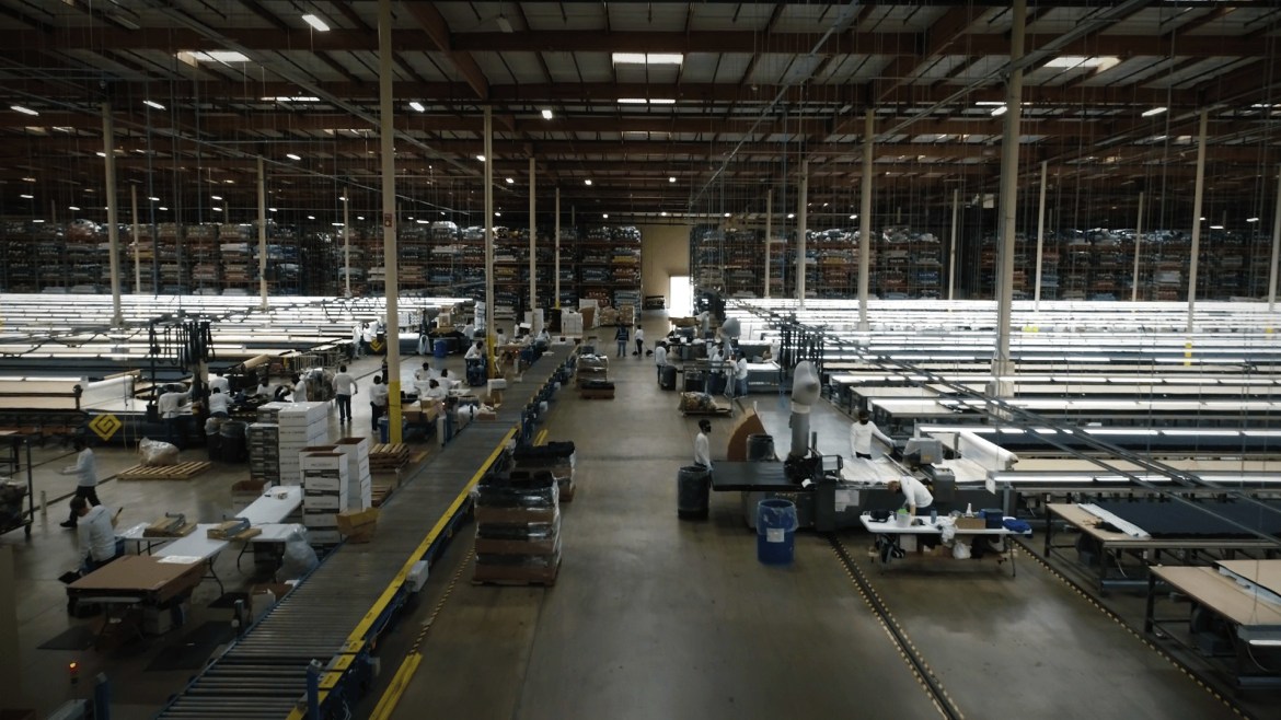 Mask Production At BELLA+CANVAS Manufacturing Warehouse In Los Angeles