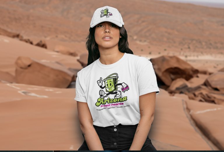 crewneck t shirt mockup of a woman with a dad hat posing in front of Arizona Rocks 768x521